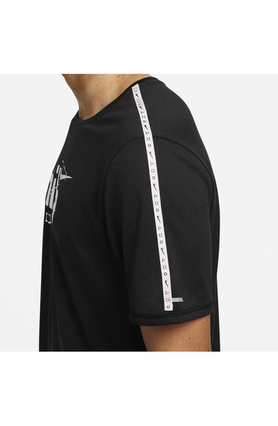 Shop Nike Miler Dri-fit Running Logo Graphic Tee In Black/ Pink Foam