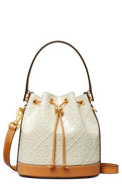 Shop Tory Burch T Monogram Embossed Leather Bucket Bag In Cream