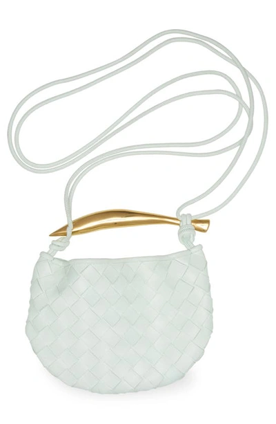 Shop Bottega Veneta Sardine Intrecciato Crossbody Bag In 9104 Chalk-m Brass