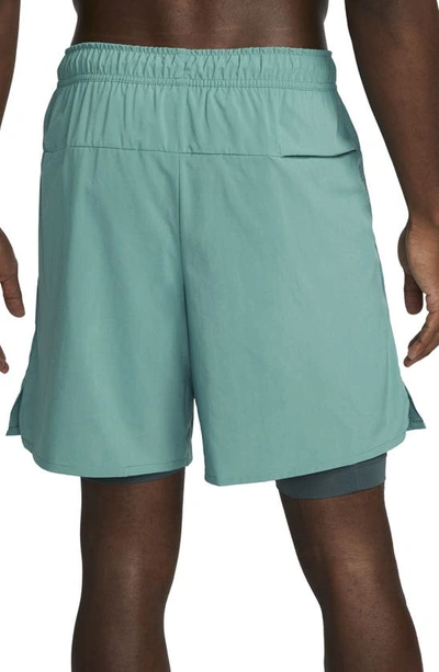Shop Nike Dri-fit Unlimited 2-in-1 Versatile Shorts In Mineral Teal/ Spruce/ Black