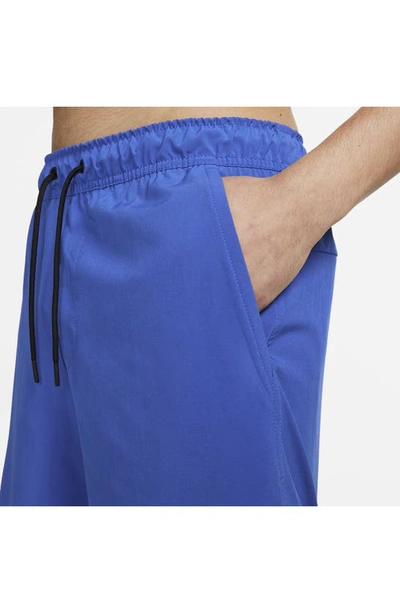 Shop Nike Dri-fit Unlimited 2-in-1 Versatile Shorts In Game Royal/ Black