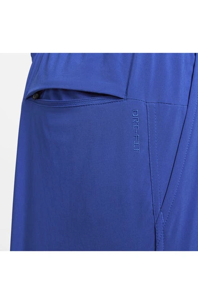 Shop Nike Dri-fit Unlimited 2-in-1 Versatile Shorts In Game Royal/ Black