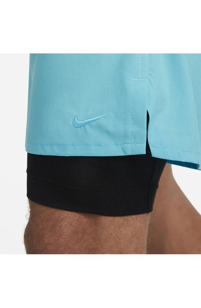 Shop Nike Dri-fit Unlimited 2-in-1 Versatile Shorts In Baltic Blue/ Black