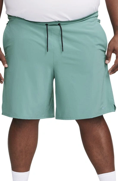 Shop Nike Dri-fit Unlimited Training Shorts In Mineral Teal/ Black