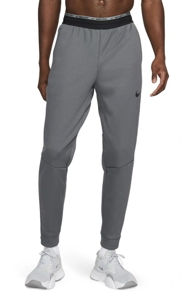 Shop Nike Pro Therma-fit Joggers In Iron Grey/ Black/ Black