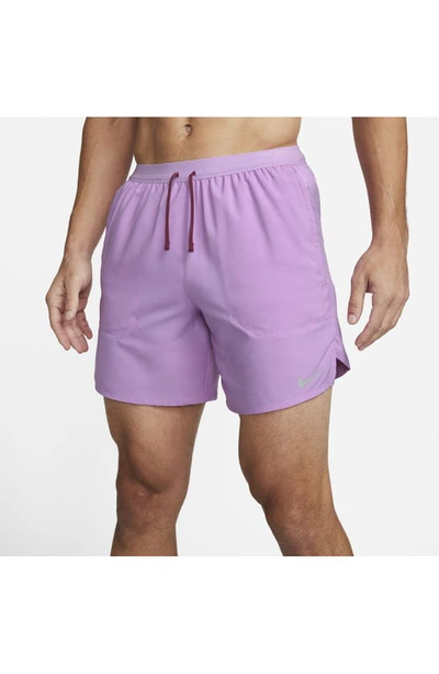 Shop Nike Dri-fit Stride 7-inch Brief-lined Running Shorts In Rush Fuchsia/ Rosewood