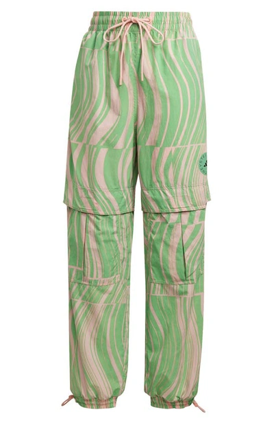 Shop Adidas By Stella Mccartney Truecasuals Woven Print Track Pants In Blush Pink/ Semi Flash Green