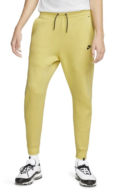 Shop Nike Tech Fleece Jogger Sweatpants In Saturn Gold/ Black