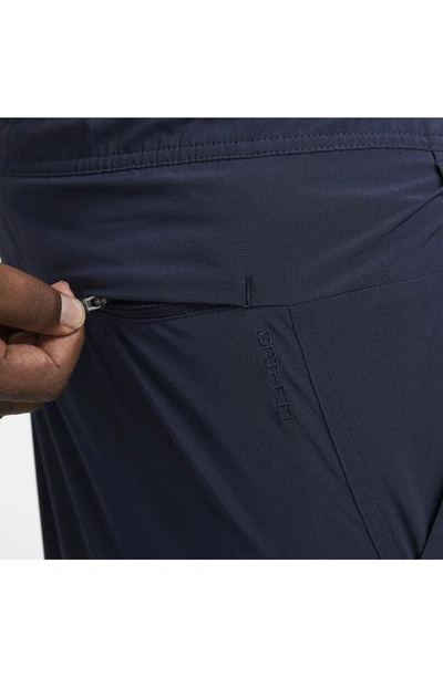 Shop Nike Dri-fit Unlimited 7-inch Unlined Athletic Shorts In Obsidian/ Black/ Obsidian