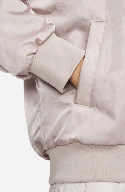 Shop Nike Sportswear Reversible Varsity Quilted Bomber Jacket In Diffused Taupe/ White