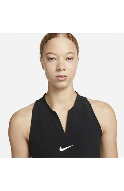Shop Nike Club Dri-fit Racerback Dress In Black/ White