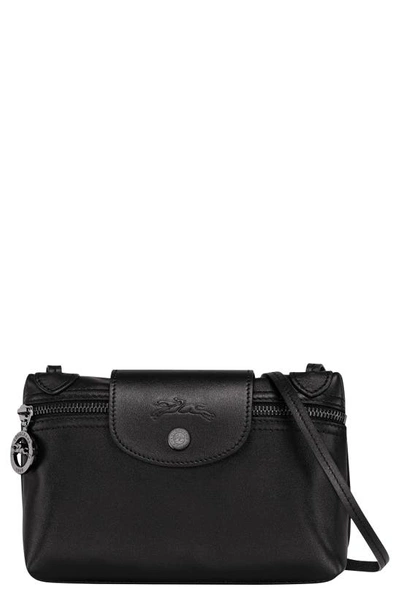 Shop Longchamp Extra Small Le Pliage Leather Crossbody Bag In Black