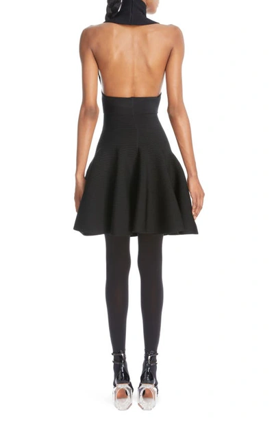 Shop Alaïa Circular Cutout Turtleneck Rib Sweater Dress In Noir Alaia