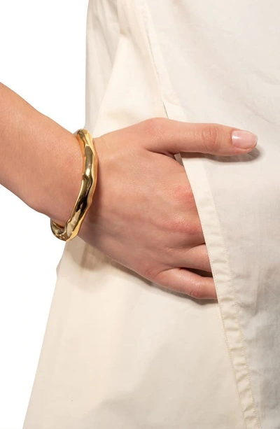 Shop Alexis Bittar Molten Bangle Bracelet In Gold