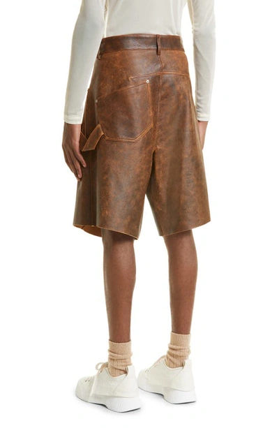 Shop Jw Anderson Twisted Lambskin Leather Shorts In Brown