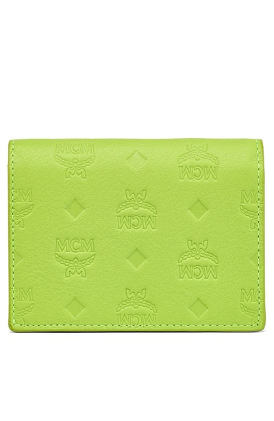 Shop Mcm Aren Flap Trifold Mini Wallet In Acid Lime