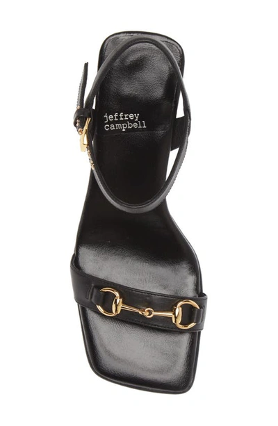 Shop Jeffrey Campbell Lively Horsebit Sandal In Black Gold