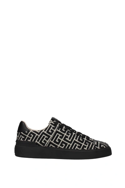 Shop Balmain Sneakers Fabric Black
