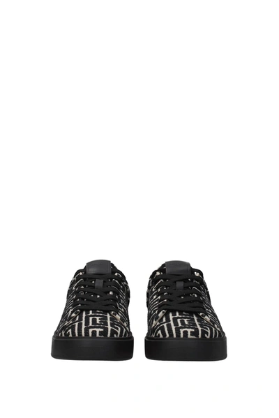 Shop Balmain Sneakers Fabric Black