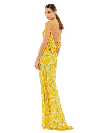 Shop Ieena For Mac Duggal Floral Print Empire Waist Bias Cut Sleeveless Trumpet Gown In Yellow