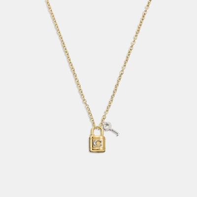 Shop Coach Outlet Signature Padlock And Key Necklace In Silver