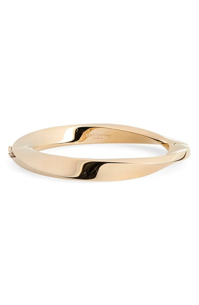 Shop Saint Laurent Twist Deco Bracelet In Dore