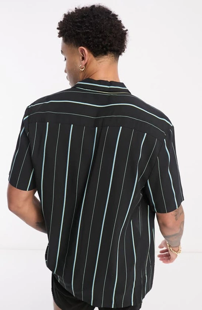Shop Asos Design Stripe Button-up Shirt In Black
