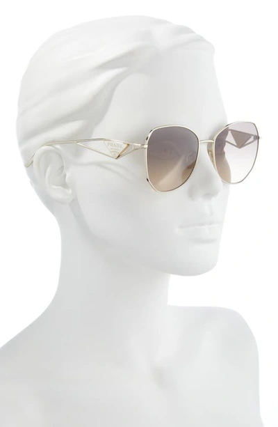 Shop Prada 57mm Gradient Round Sunglasses In Pale Gold