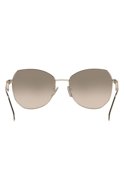 Shop Prada 57mm Gradient Round Sunglasses In Pale Gold