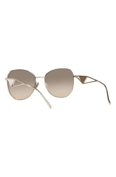 Shop Prada 57mm Gradient Round Sunglasses In Pale Gold