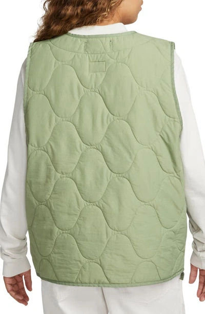 Shop Nike Woven Insulated Military Vest In Oil Green/ White