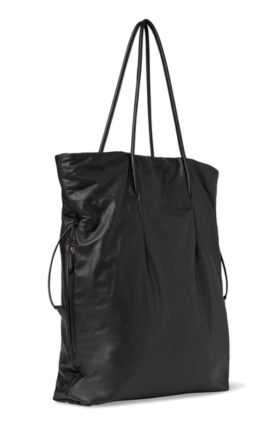Shop The Row Polly Drawcord Leather Tote In Black