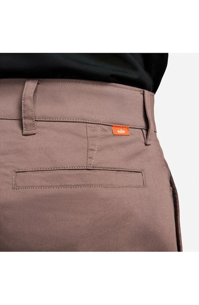 Shop Nike Dri-fit Uv Flat Front Chino Golf Shorts In Plum Eclipse