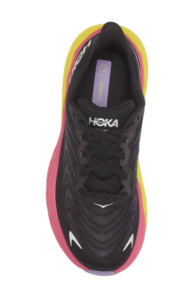 Shop Hoka Arahi 6 Running Shoe In Black / Pink Yarrow