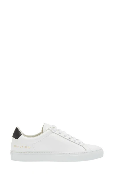 Shop Common Projects Retro Low Top Sneaker In White/ Black