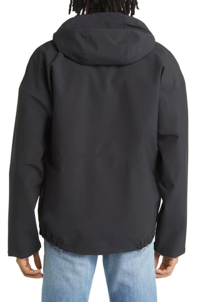 Shop Cotopaxi Cielo Water Repellent Hooded Rain Jacket In All Black