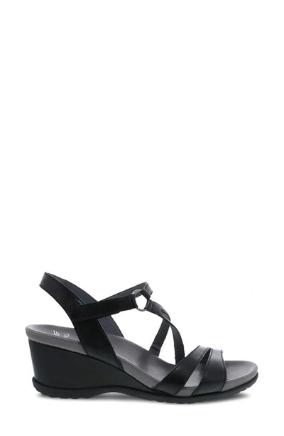 Shop Dansko Addyson Asymmetric Strappy Sandal In Black Glazed Calf