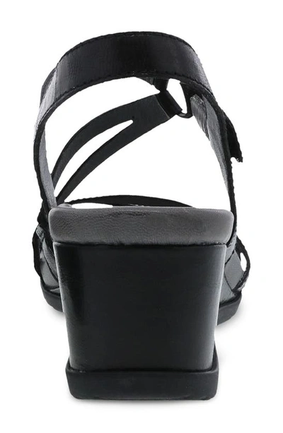 Shop Dansko Addyson Asymmetric Strappy Sandal In Black Glazed Calf