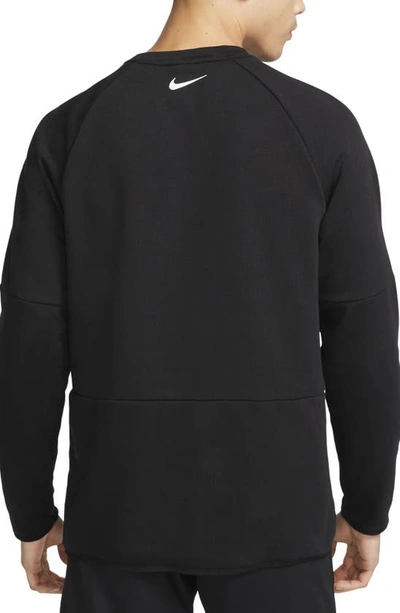 NIKE DRI-FIT MOVING CO. LONG SLEEVE GRAPHIC TEE 