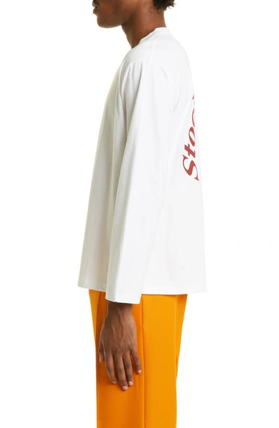 Shop Stockholm Surfboard Club Greg Logo Graphic Long Sleeve Organic Cotton Tee In White