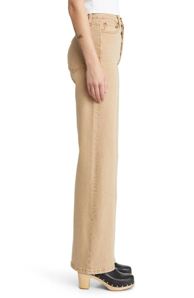 Shop Re/done '70s Ultra High Waist Wide Leg Jeans In Washed Khaki