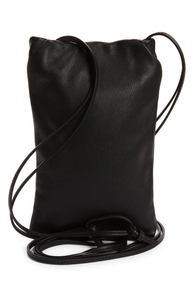 Shop The Row Ruched Leather Phone Crossbody Bag In Black Shg