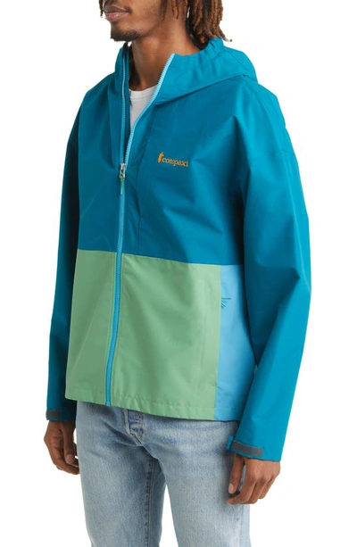 Shop Cotopaxi Cielo Water Repellent Hooded Rain Jacket In Blue