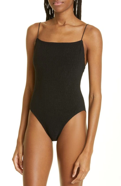 Shop Totême Smocked One-piece Swimsuit In Black
