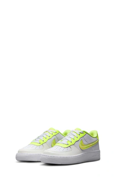 Shop Nike Kids' Air Force 1 Lv8 Sneaker In White/ Volt/ Pink / Multi