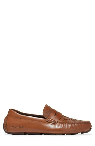 Shop Cole Haan Grand Laser Driving Penny Loafer In British Tan/ Java
