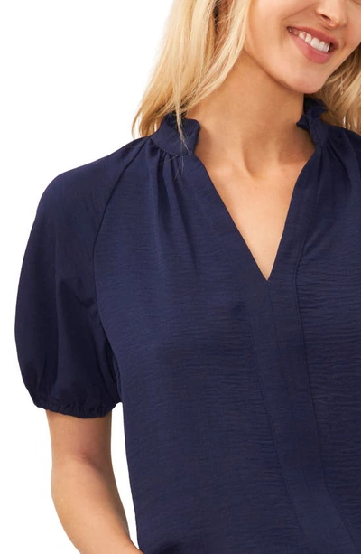 Cece Ruffle Neck Raglan Seam Split Neck Blouse In Classic Navy