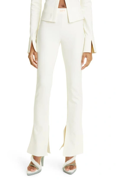 Shop Off-white Split Hem Stretch Crepe Flare Leg Leggings In White