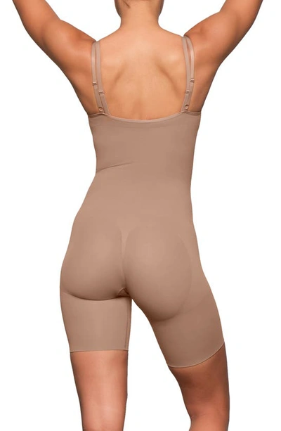 Shop Skims Butt Enhancing Open Bust Bodysuit In Sienna