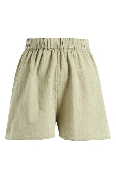 Shop Asos Design Textured Cotton Beach Shorts In Khaki